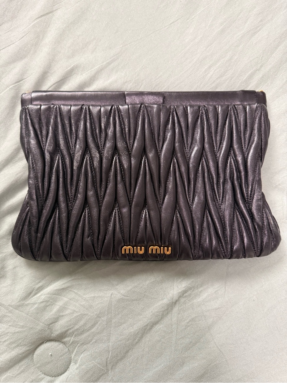 Miu Miu Black Matelassé Leather Clutch with Gold Logo